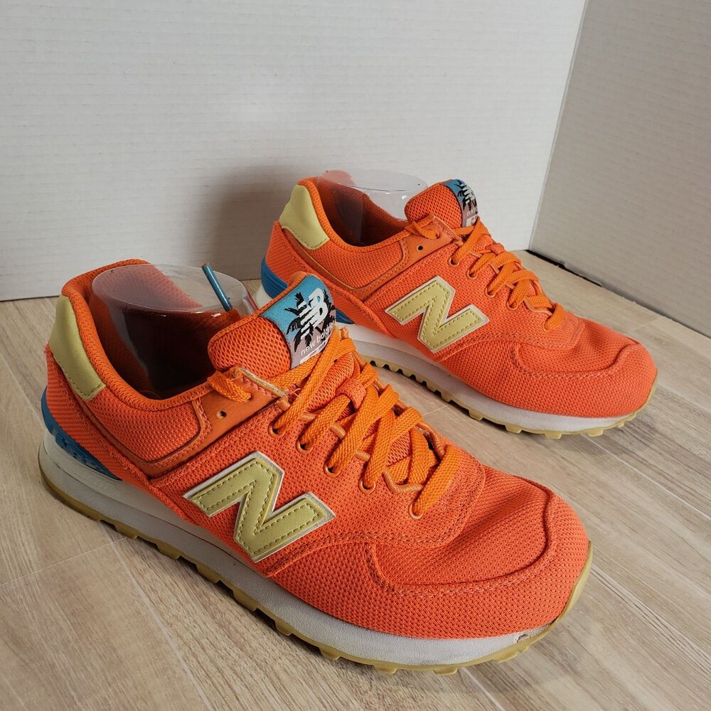 New Balance Orange Sneakers with Yellow Logo and Blue Heel